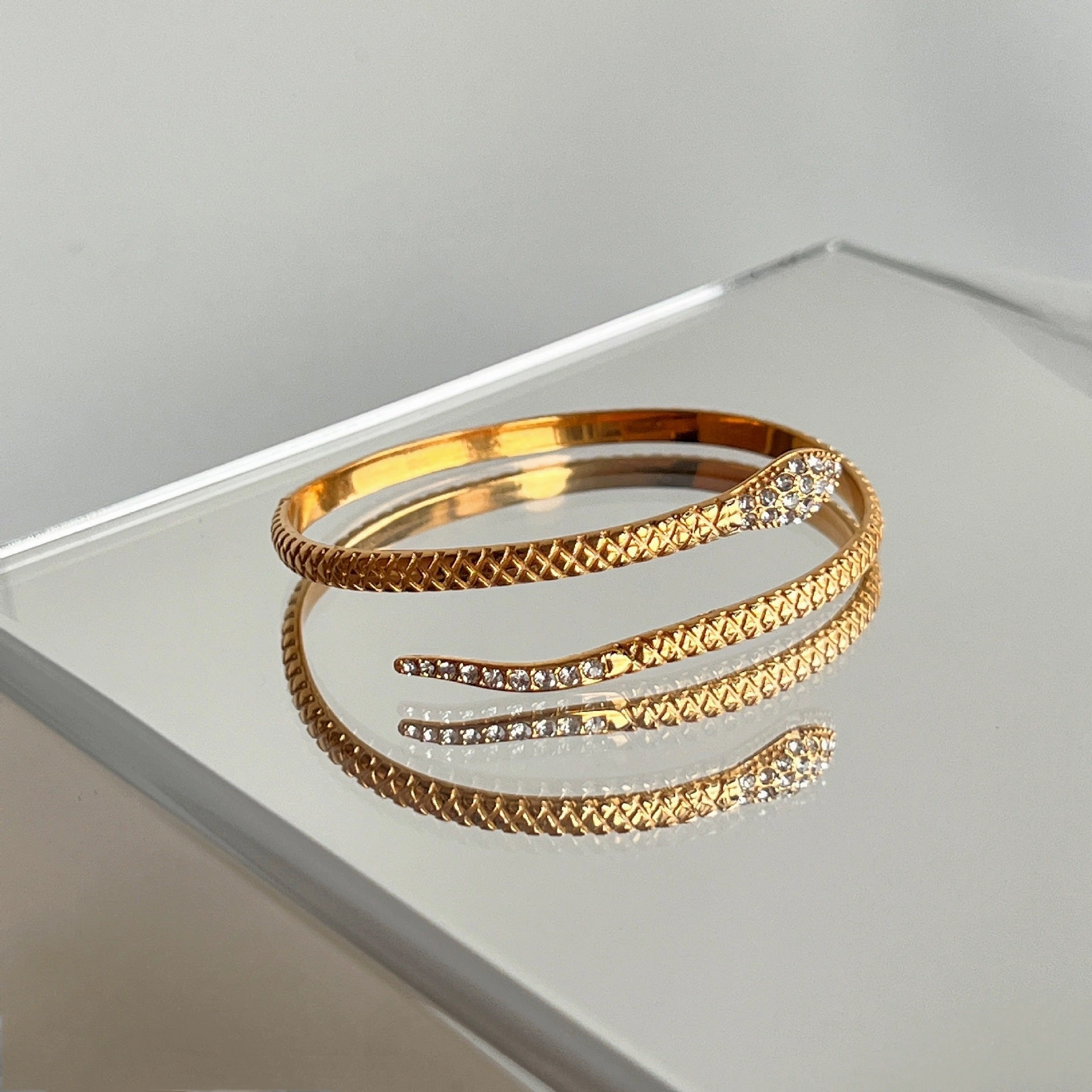 Wholesale 18k Electroplated Titanium Steel Micropaved Zircon Open Snake Bracelet