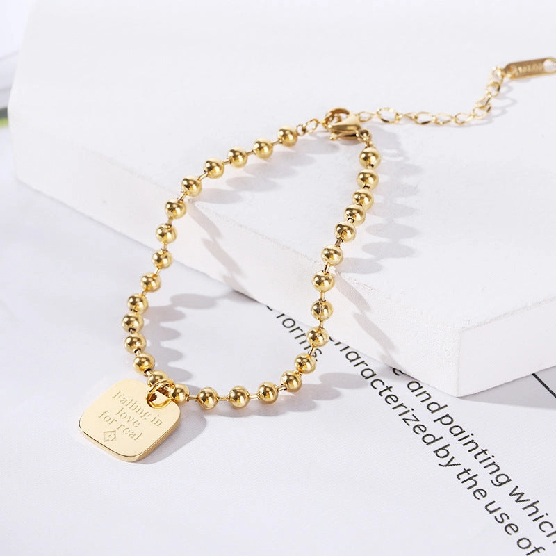 Wholesale 18K gold-plated titanium steel trendy simple geometric tag round bead chain bracelet