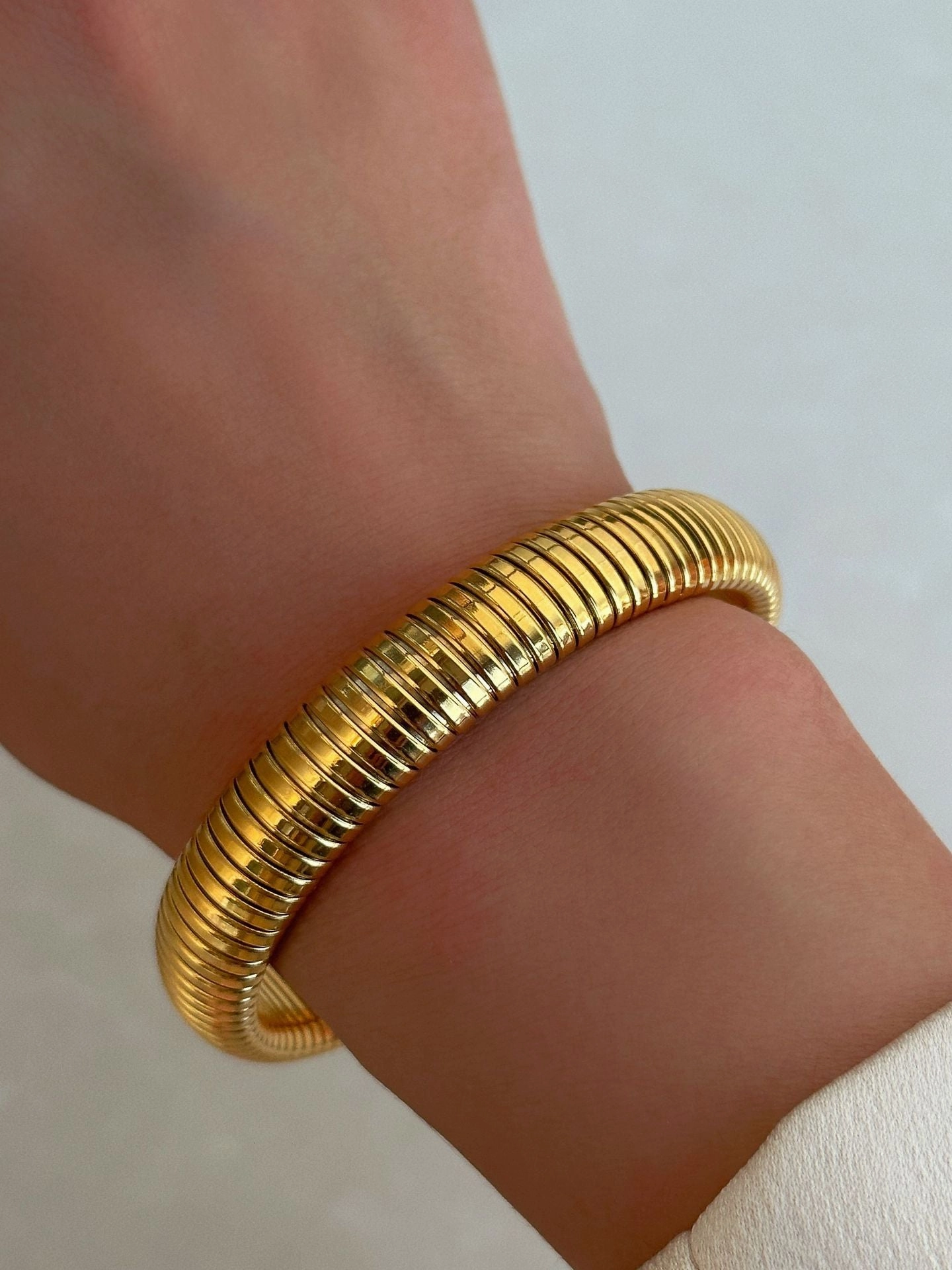 Wholesale 18k Real Gold Electroplated Titanium Steel Stretch Polished Bracelet