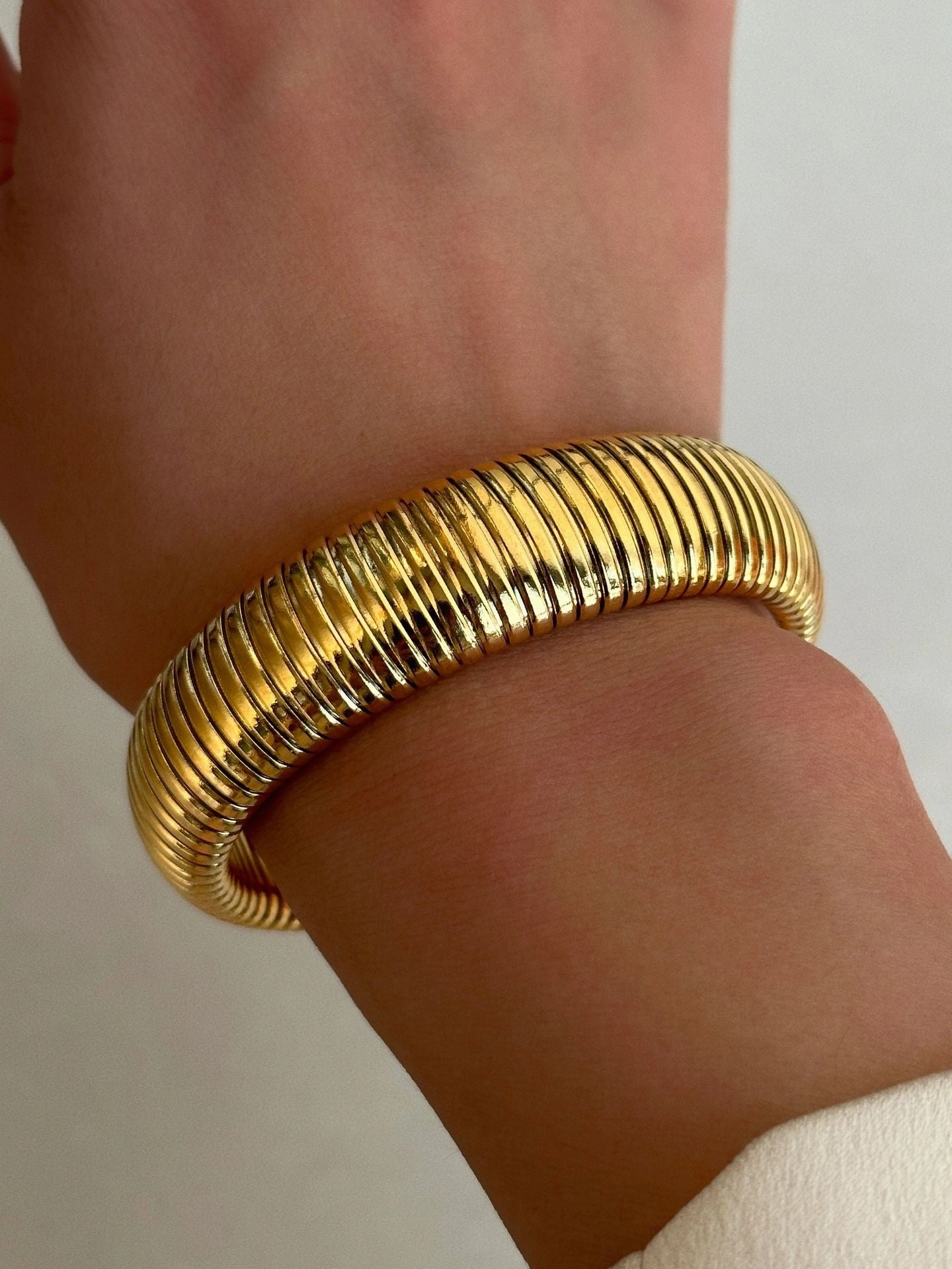 Wholesale 18k Real Gold Electroplated Titanium Steel Stretch Polished Bracelet