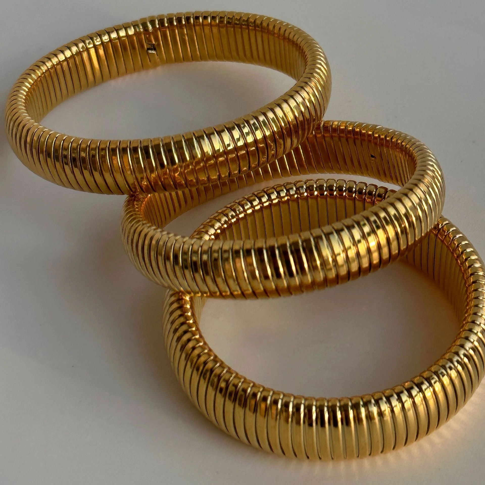 Wholesale 18k Real Gold Electroplated Titanium Steel Stretch Polished Bracelet
