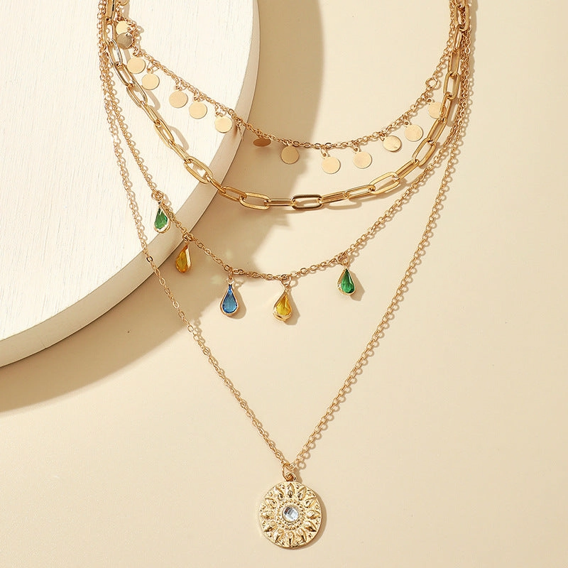 Wholesale Alloy Buckle Rhinestone Tassel Embossed Disc Pendant Necklace