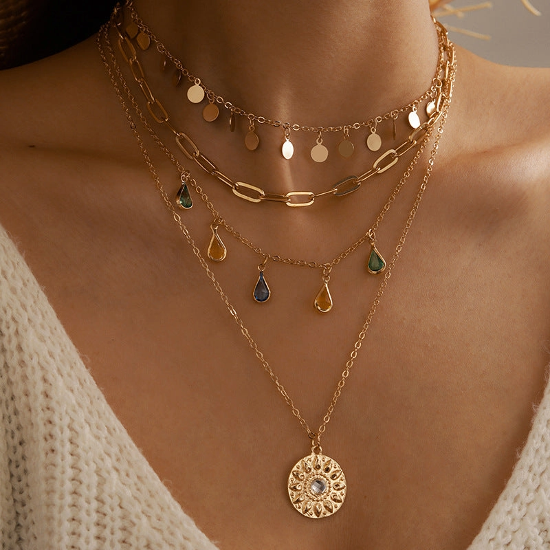 Wholesale Alloy Buckle Rhinestone Tassel Embossed Disc Pendant Necklace