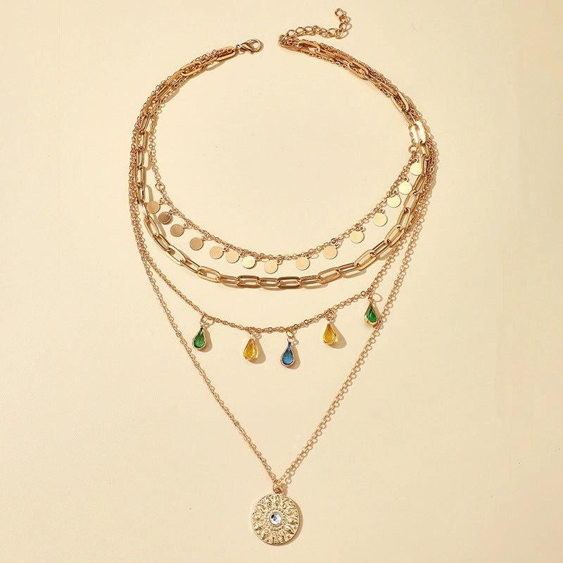 Wholesale Alloy Buckle Rhinestone Tassel Embossed Disc Pendant Necklace