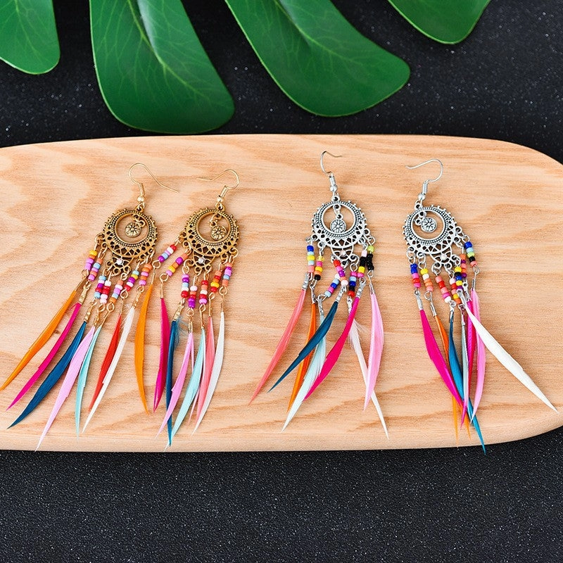 Wholesale Alloy Hollow Long Feather Earrings