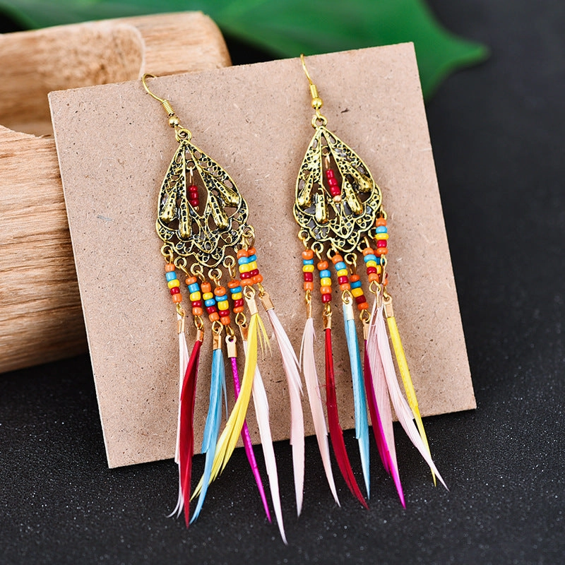 Wholesale Alloy Hollow Long Feather Earrings