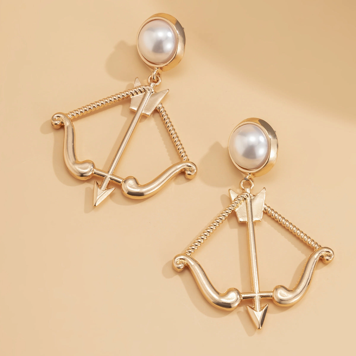 Wholesale Alloy Imitation Pearl Bow and Arrow Geometric Earrings