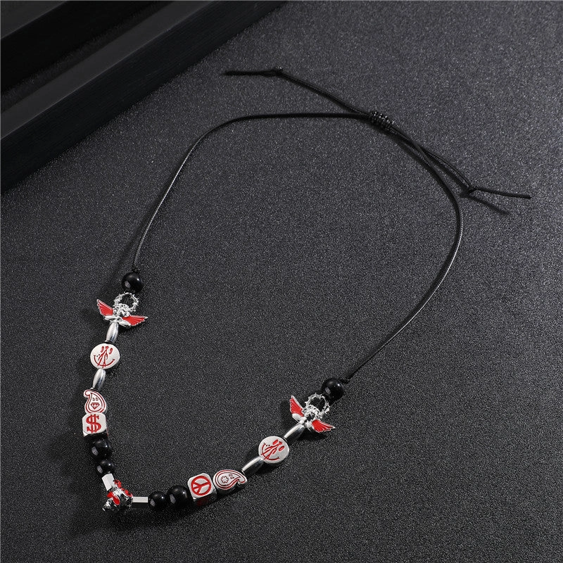 Wholesale Alloy Smiley Skull Angel Black Pearl Necklace