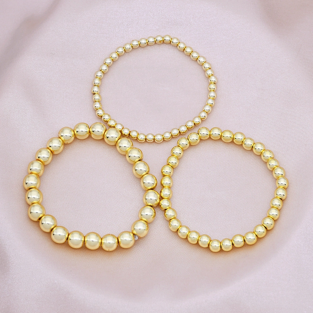 Wholesale beaded gold bracelet men's and women's color-retaining gold-plated elastic multi-layer stacked round bead bracelet bracelet