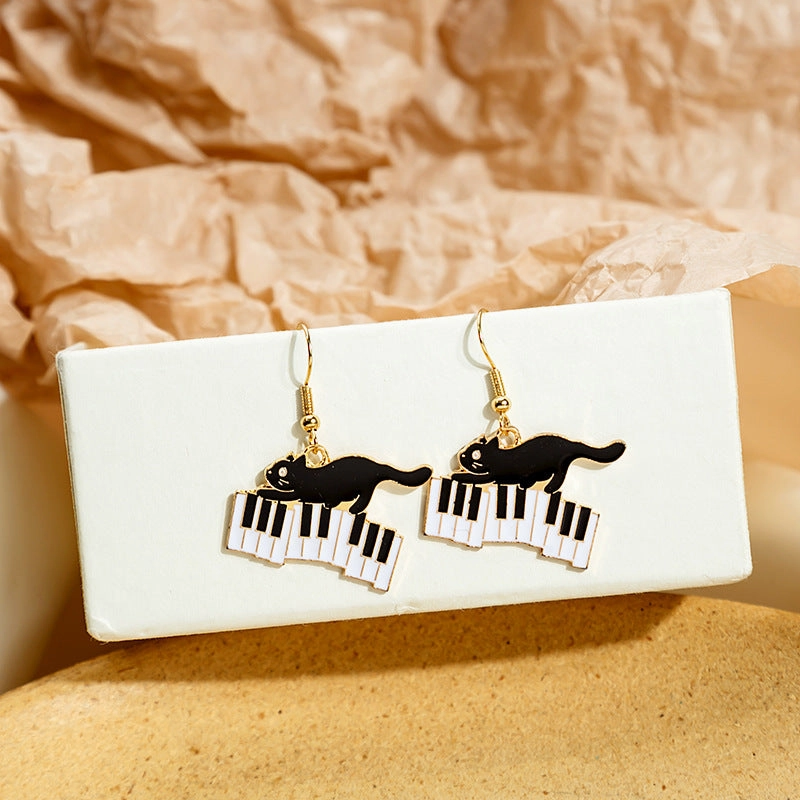 Wholesale Black and White Cat Alphabet Piano Cat Earrings