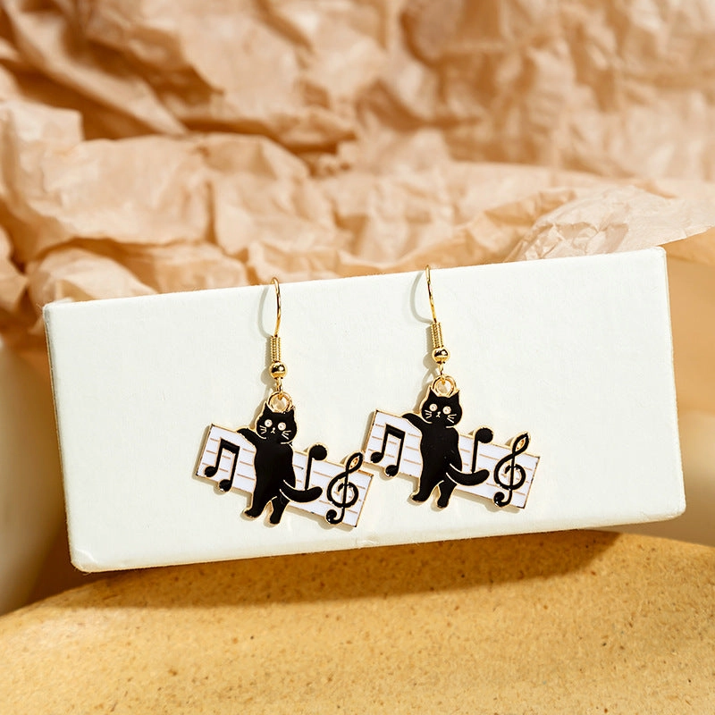 Wholesale Black and White Cat Alphabet Piano Cat Earrings