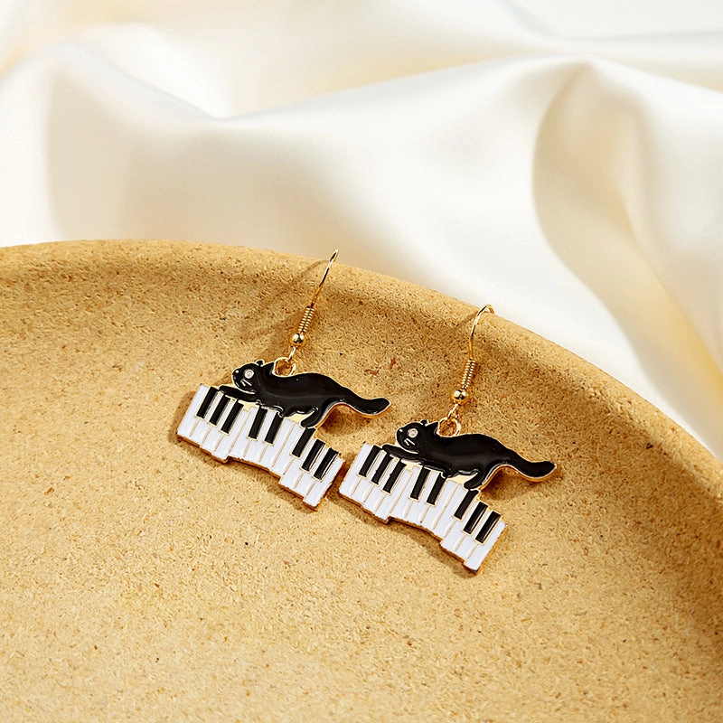 Wholesale Black and White Cat Alphabet Piano Cat Earrings