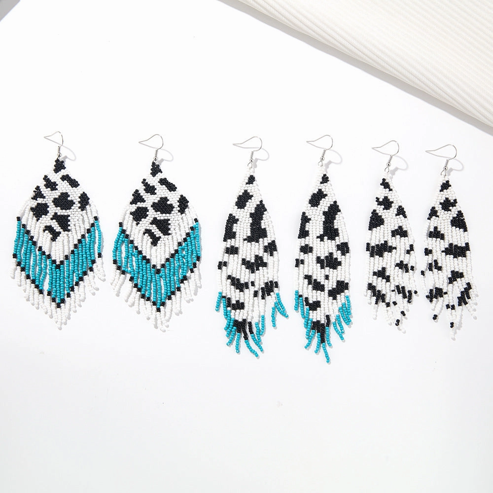 Wholesale Bohemian Handmade Woven Cow Grain Rice Bead Tassel Earrings