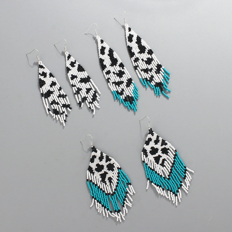 Wholesale Bohemian Rice Beads Handwoven Cow Pattern Long Tassel Earrings