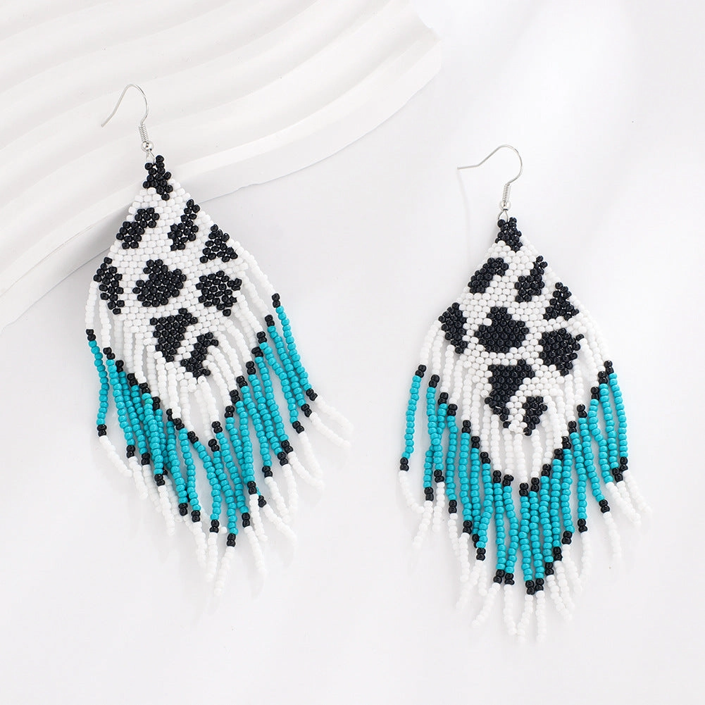 Wholesale Bohemian Rice Beads Handwoven Cow Pattern Long Tassel Earrings