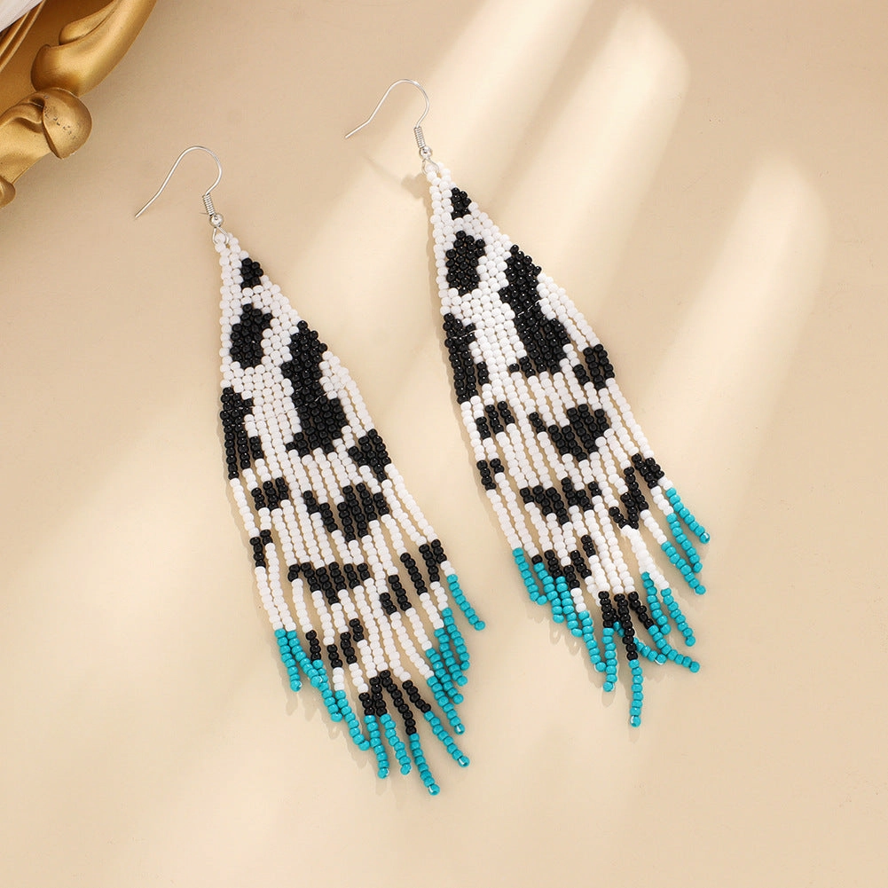 Wholesale Bohemian Rice Beads Handwoven Cow Pattern Long Tassel Earrings