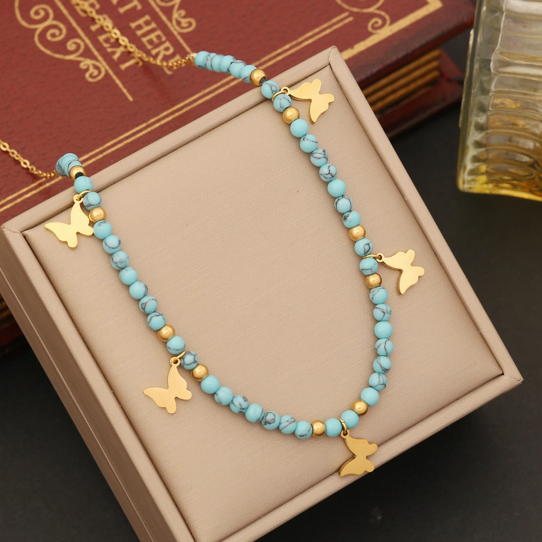 Wholesale Bohemian Turquoise Stainless Steel Eyes Butterfly Necklaces