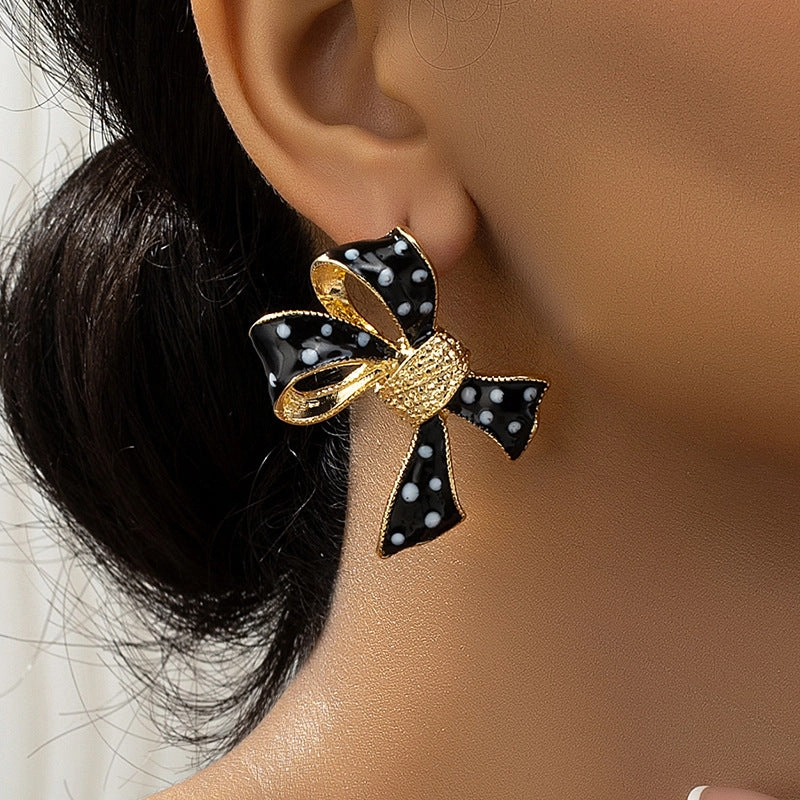 Wholesale Bow Earrings Oil Dripping Spots Zinc Alloy Earrings