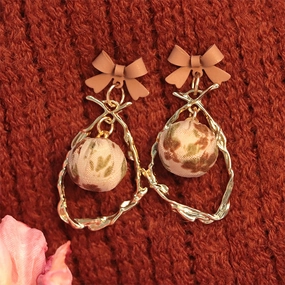 Wholesale Bow Hollow Alloy Earrings
