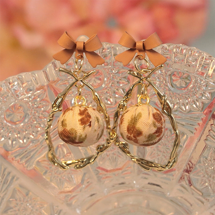 Wholesale Bow Hollow Alloy Earrings