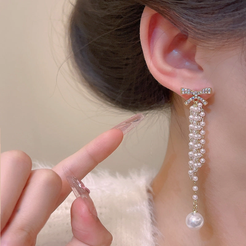 Wholesale Bow Knot Pearl Tassel Alloy Earrings