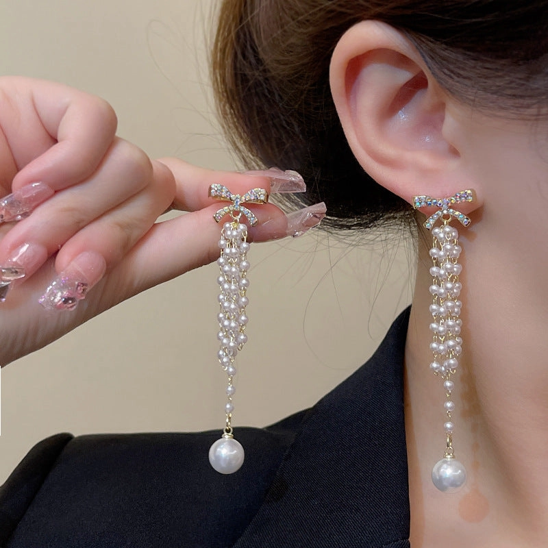 Wholesale Bow Knot Pearl Tassel Alloy Earrings