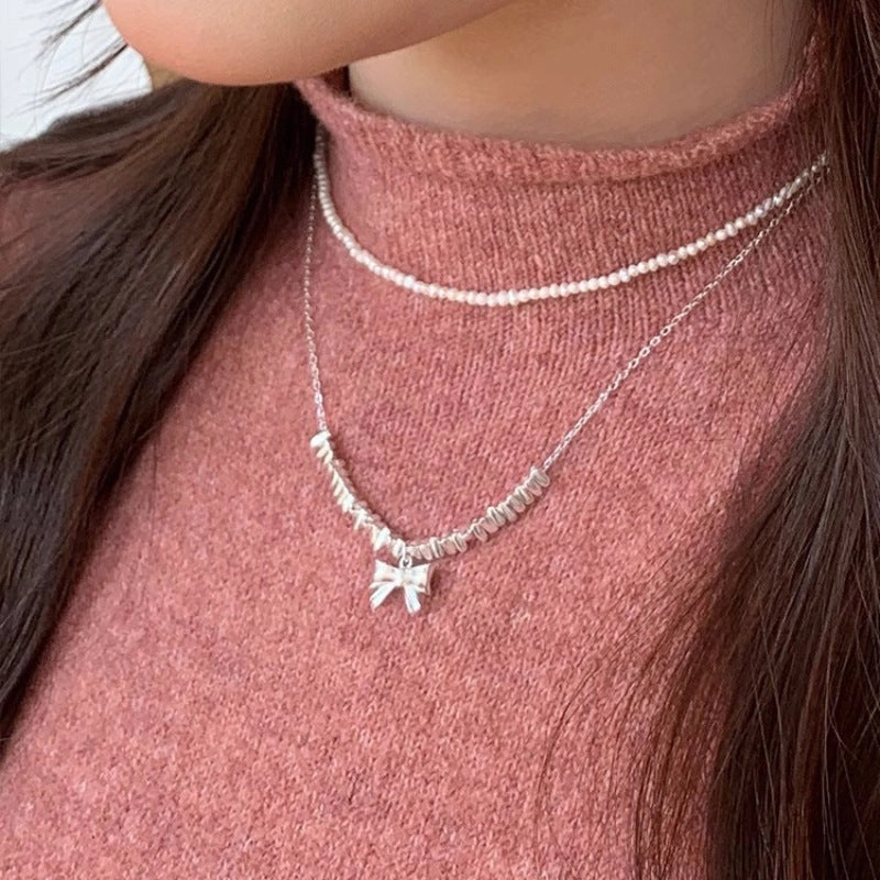 Wholesale broken silver bow necklace sweater chain copper necklace