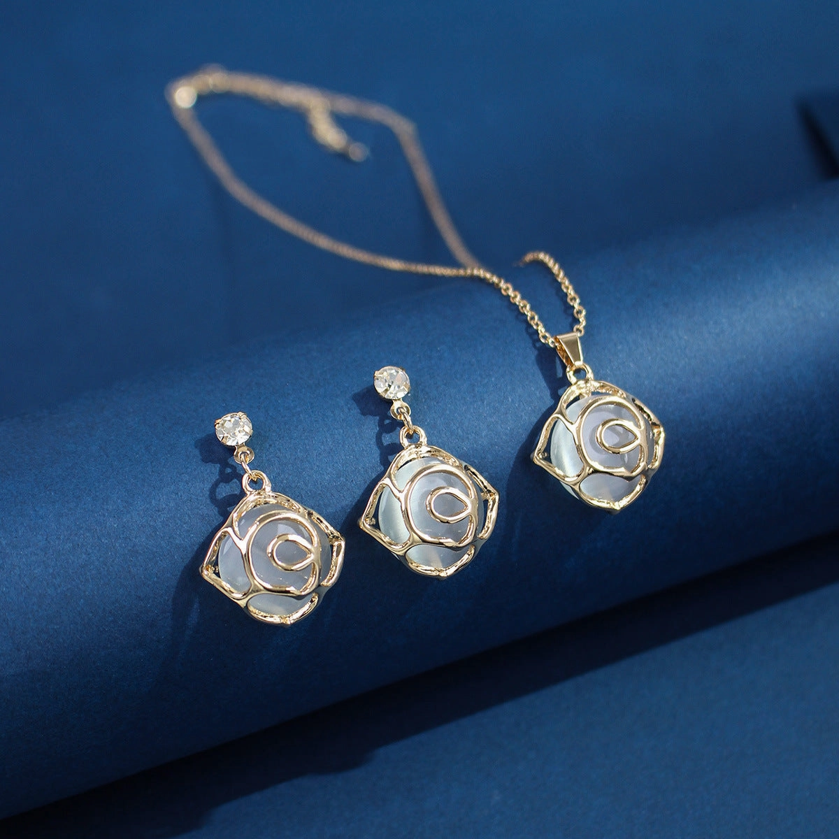 Wholesale Cat's Eye Camellia Alloy Earrings