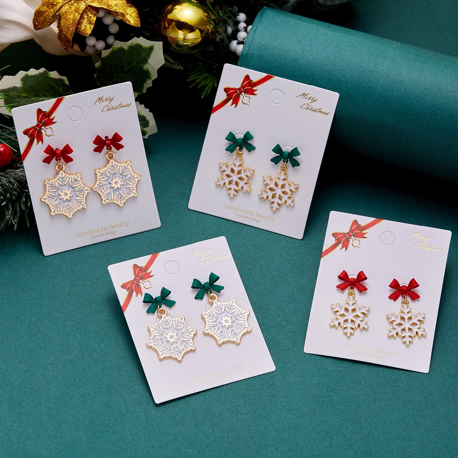 Wholesale Christmas Drip Oil Bow Knot Hollow Snowflake Alloy Earrings