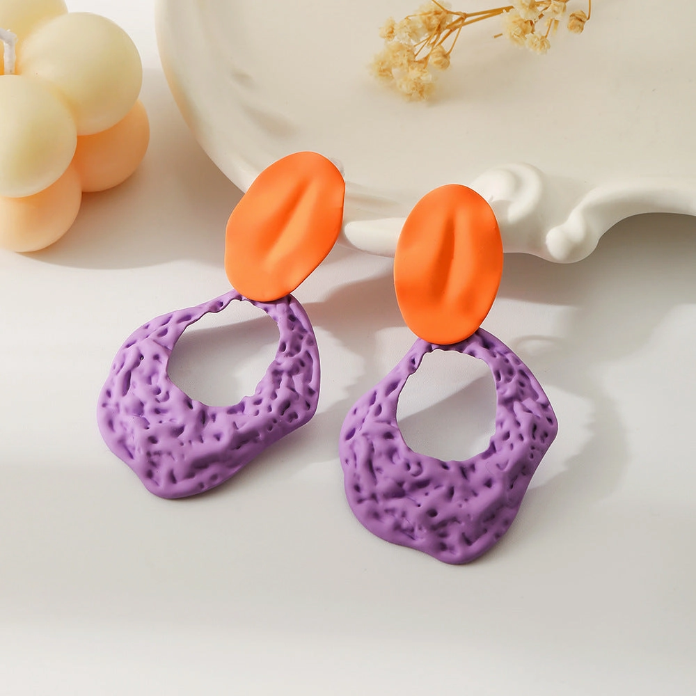 Wholesale Color Spray Painted Ellipse Hollow Out Rock Texture Metal Earrings