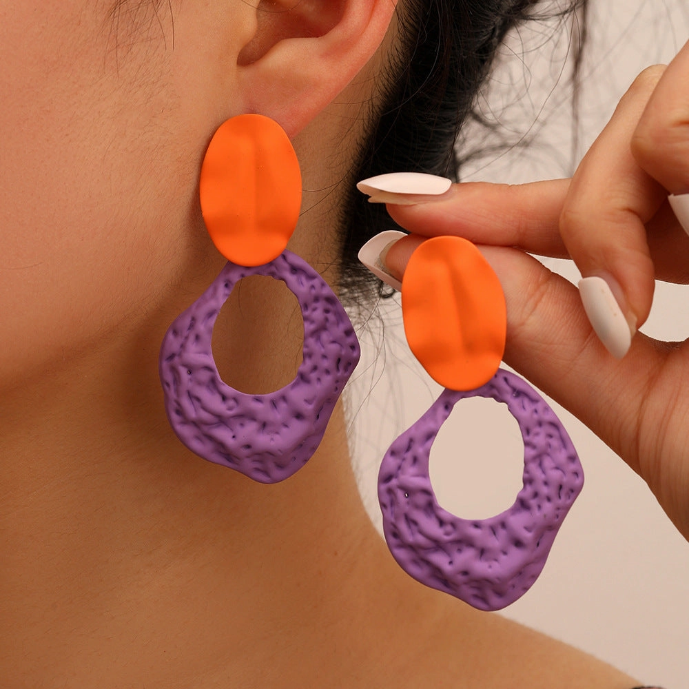 Wholesale Color Spray Painted Ellipse Hollow Out Rock Texture Metal Earrings