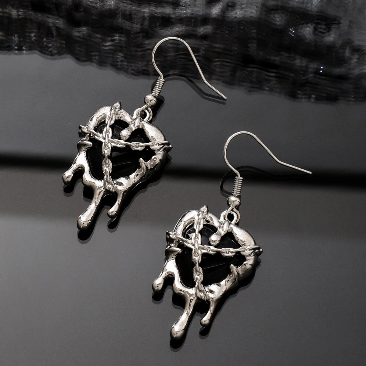 Wholesale Confined Heart Lava Heart Blood Punk Alloy Earrings