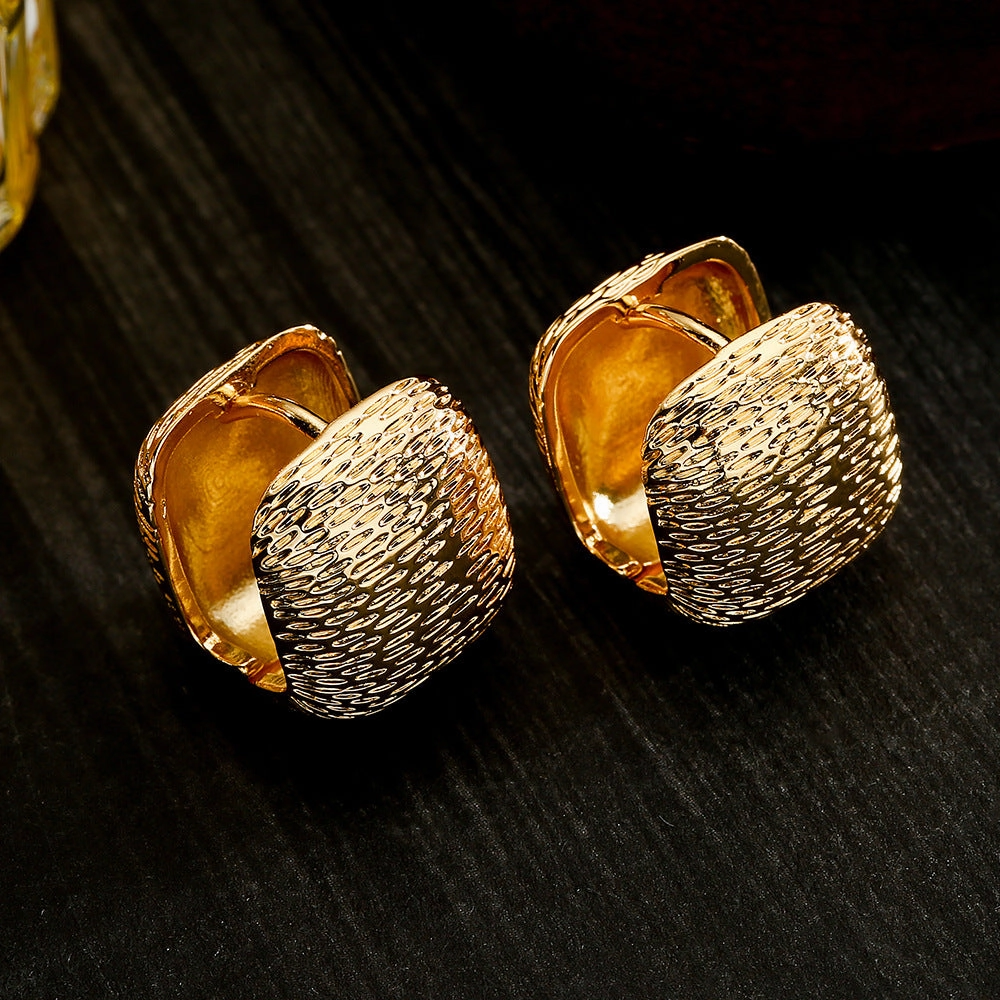Wholesale Copper Plated Real Gold Simple Earrings