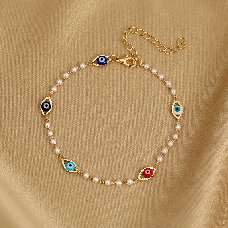 Wholesale Devil Eye Pearl Alloy Bracelet