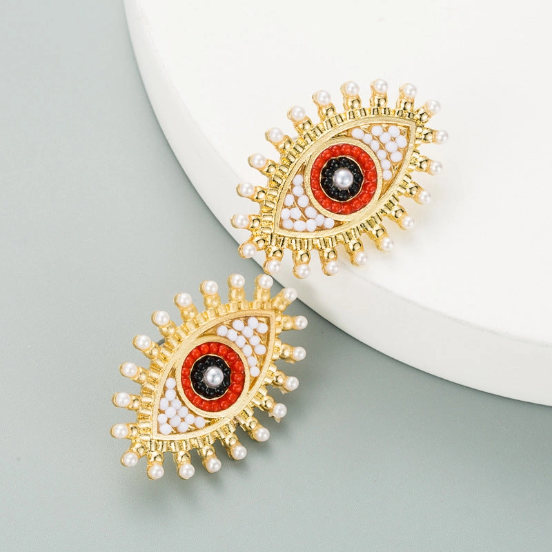Wholesale Devil's Eye Alloy Inlaid Pearl Color Rhinestone Earrings