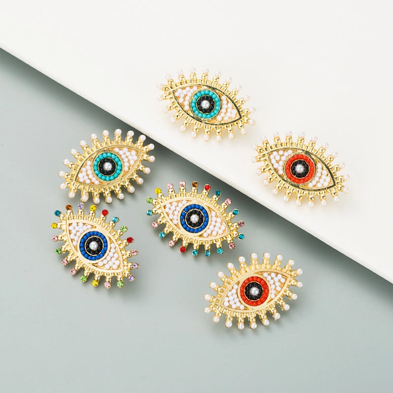 Wholesale Devil's Eye Alloy Inlaid Pearl Color Rhinestone Earrings