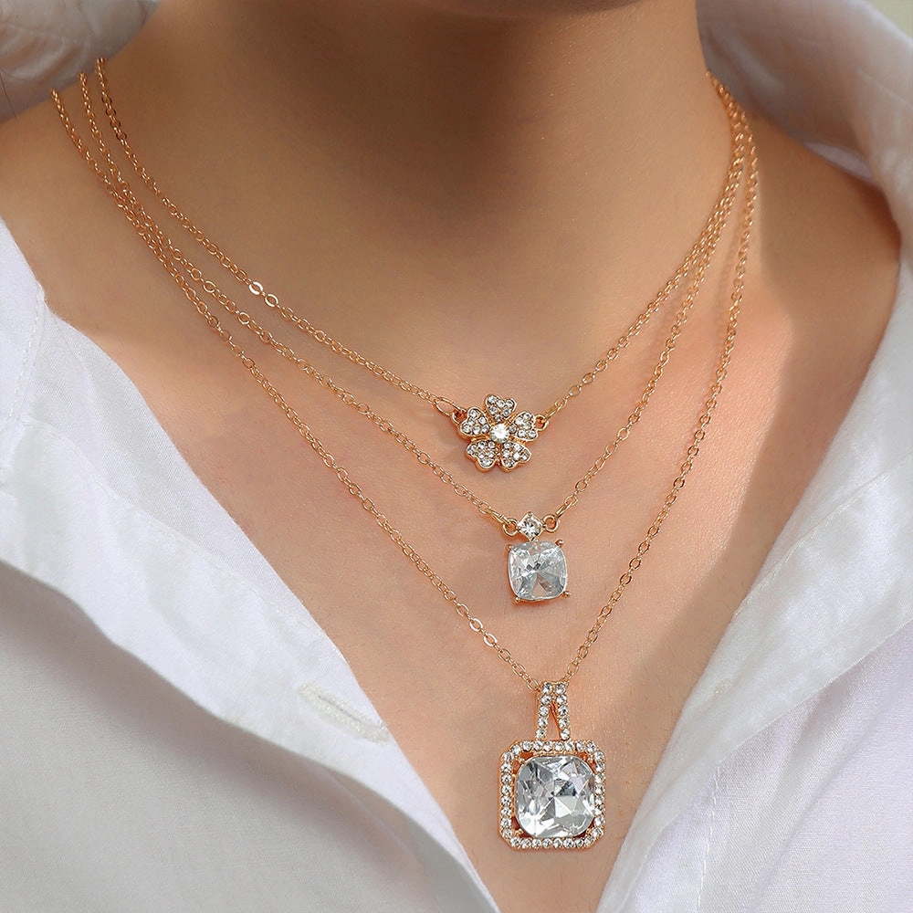 Wholesale diamond butterfly heart-shaped creative titanium steel necklace set and chain three-piece set