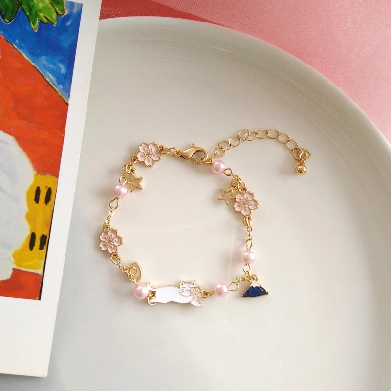 Wholesale Drip Oil Mount Fuji Flower Pearl Alloy Bracelet