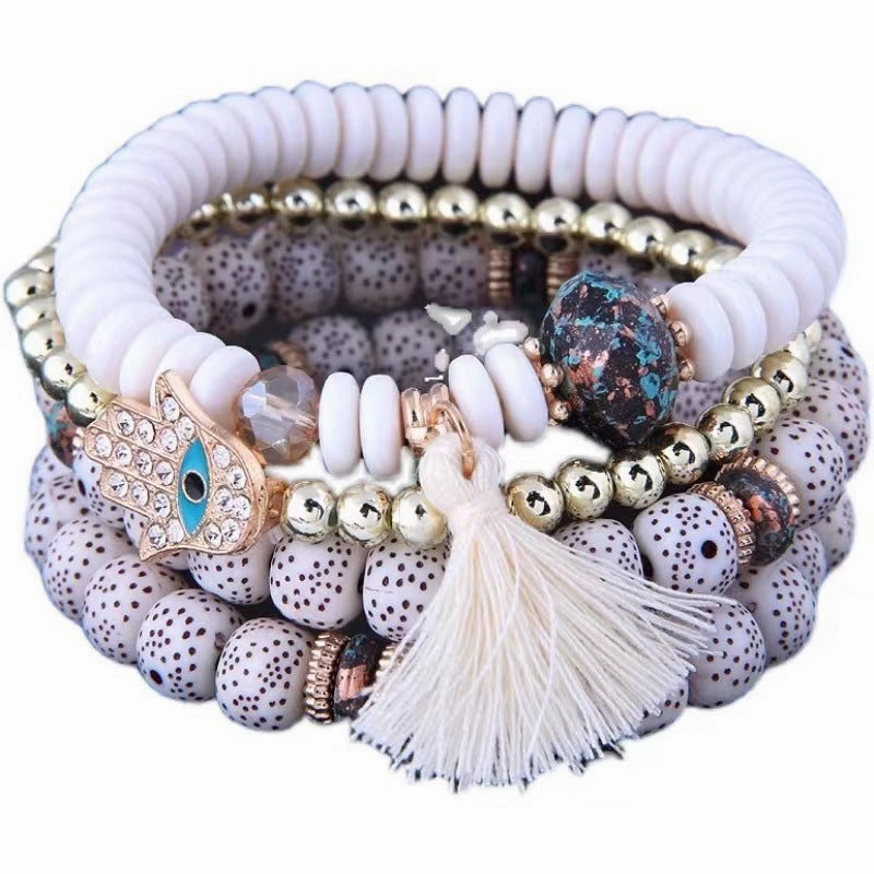 Wholesale Evil Blue Eyes Tassel Alloy Bracelet
