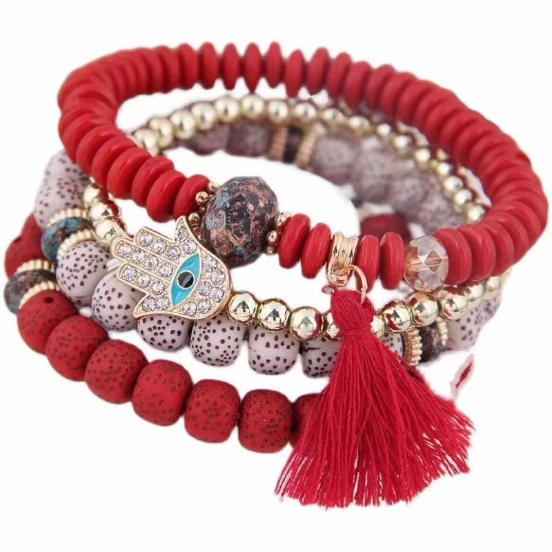 Wholesale Evil Blue Eyes Tassel Alloy Bracelet