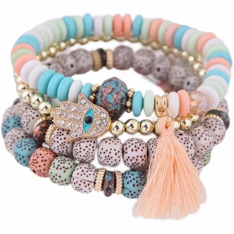 Wholesale Evil Blue Eyes Tassel Alloy Bracelet