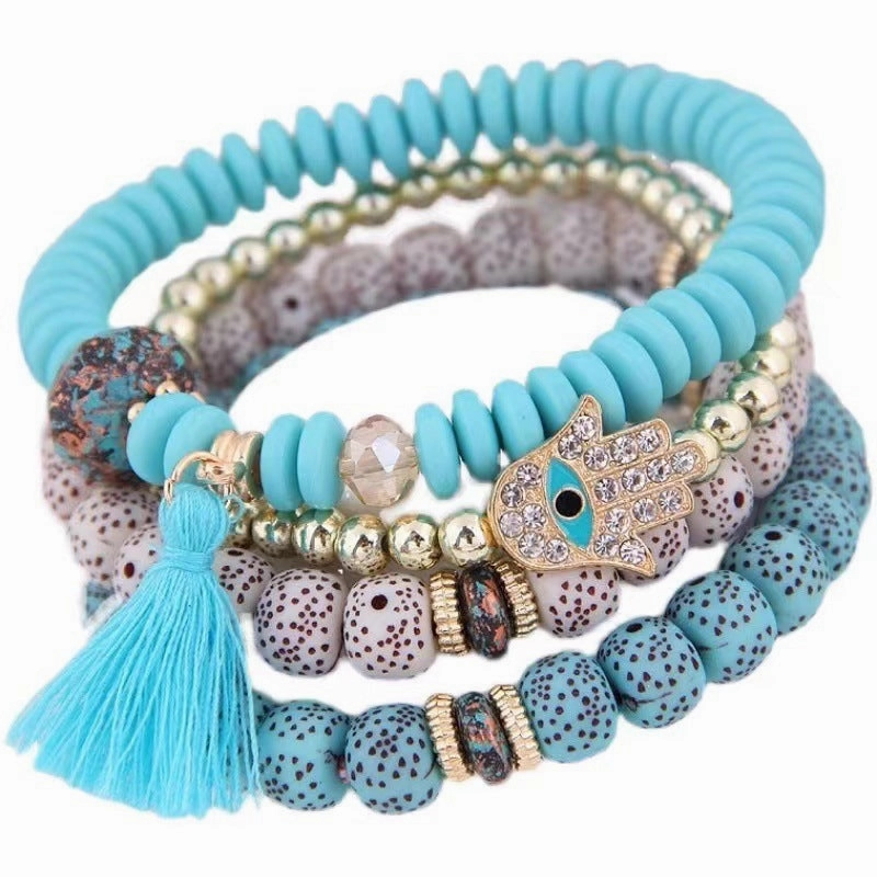 Wholesale Evil Blue Eyes Tassel Alloy Bracelet