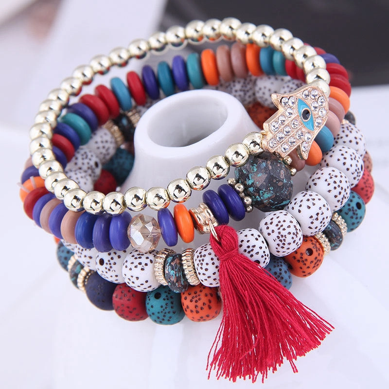 Wholesale Evil Blue Eyes Tassel Alloy Bracelet