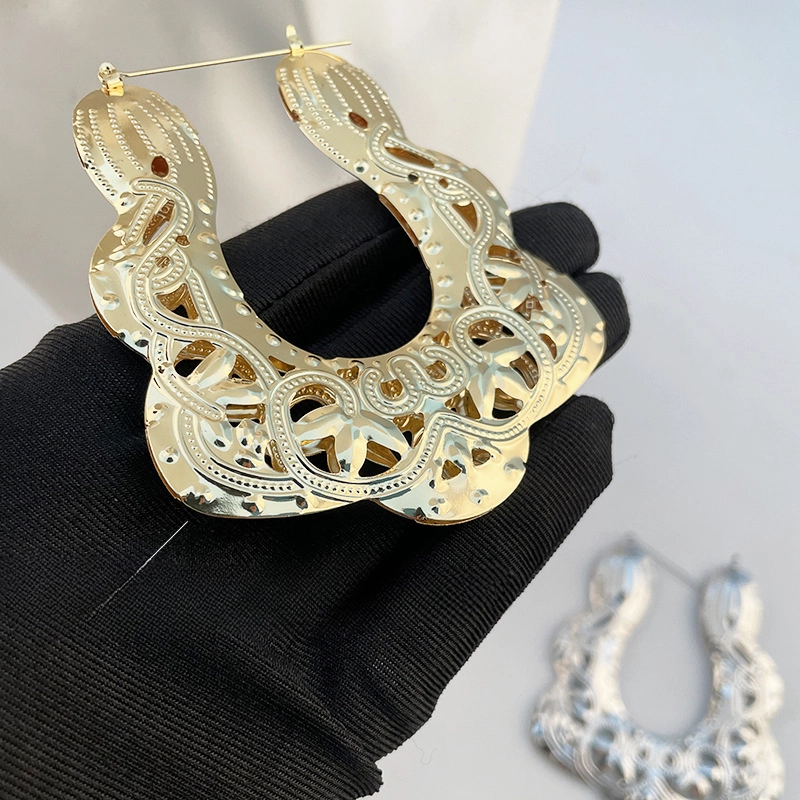 Wholesale Gold Hollow Pattern Trapezoid Metal Earrings