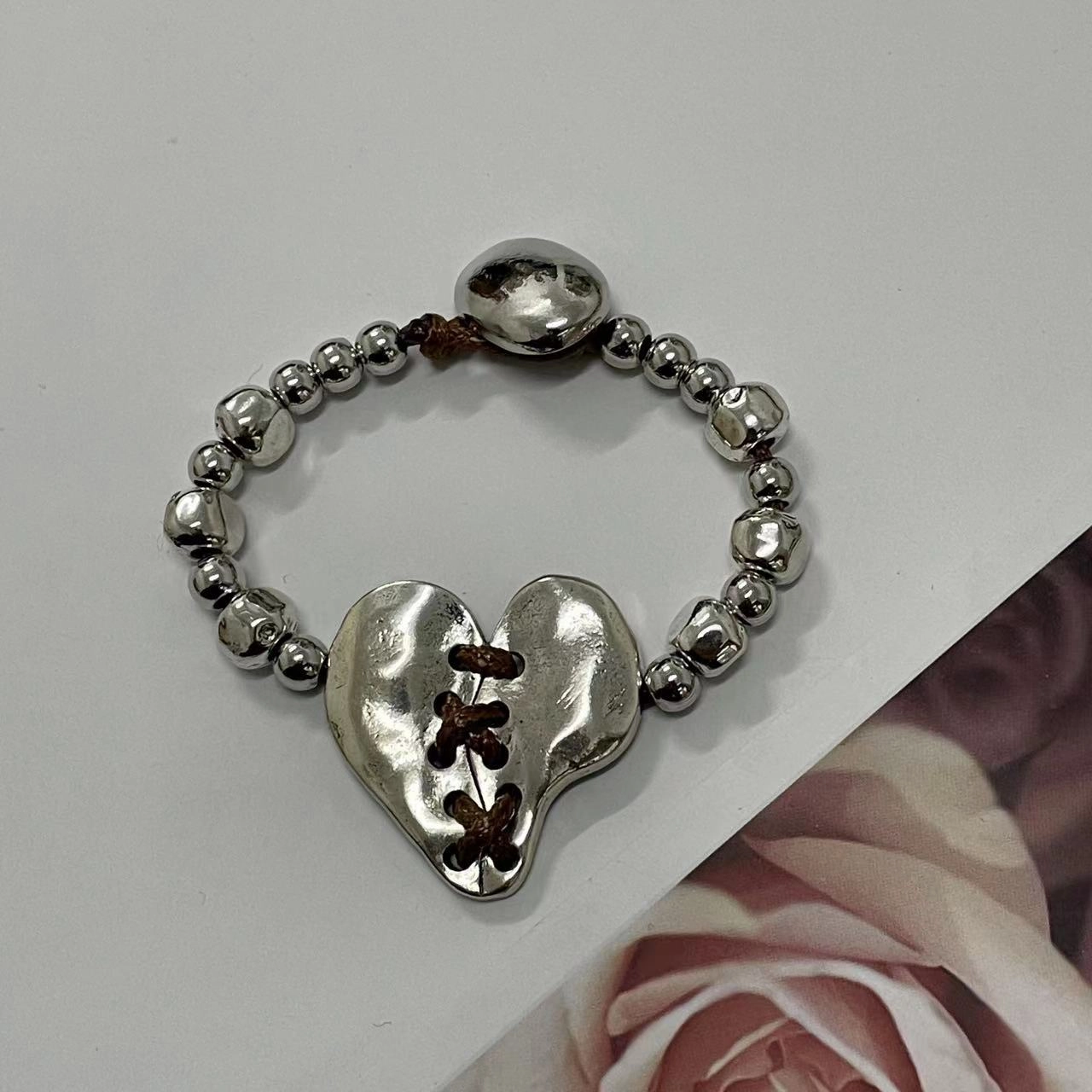 Wholesale Hand Woven Irregular Stitching Heart Beaded Leather Rope Alloy Bracelet
