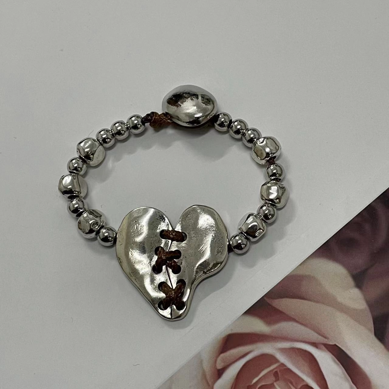 Wholesale Hand Woven Irregular Stitching Heart Beaded Leather Rope Alloy Bracelet