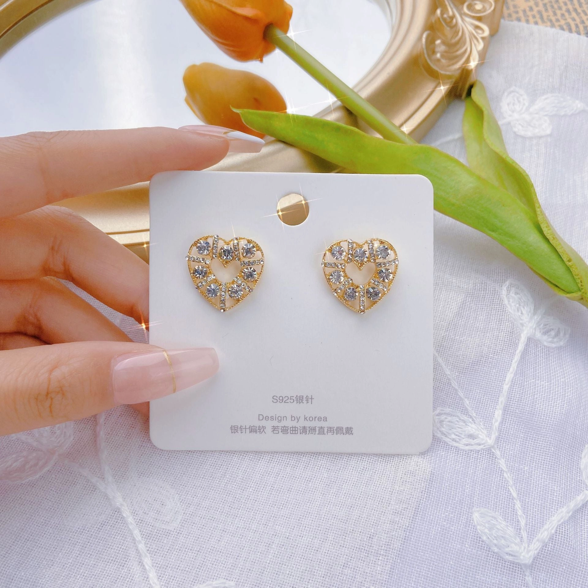 Wholesale Hollow Pearl Heart Alloy Earrings