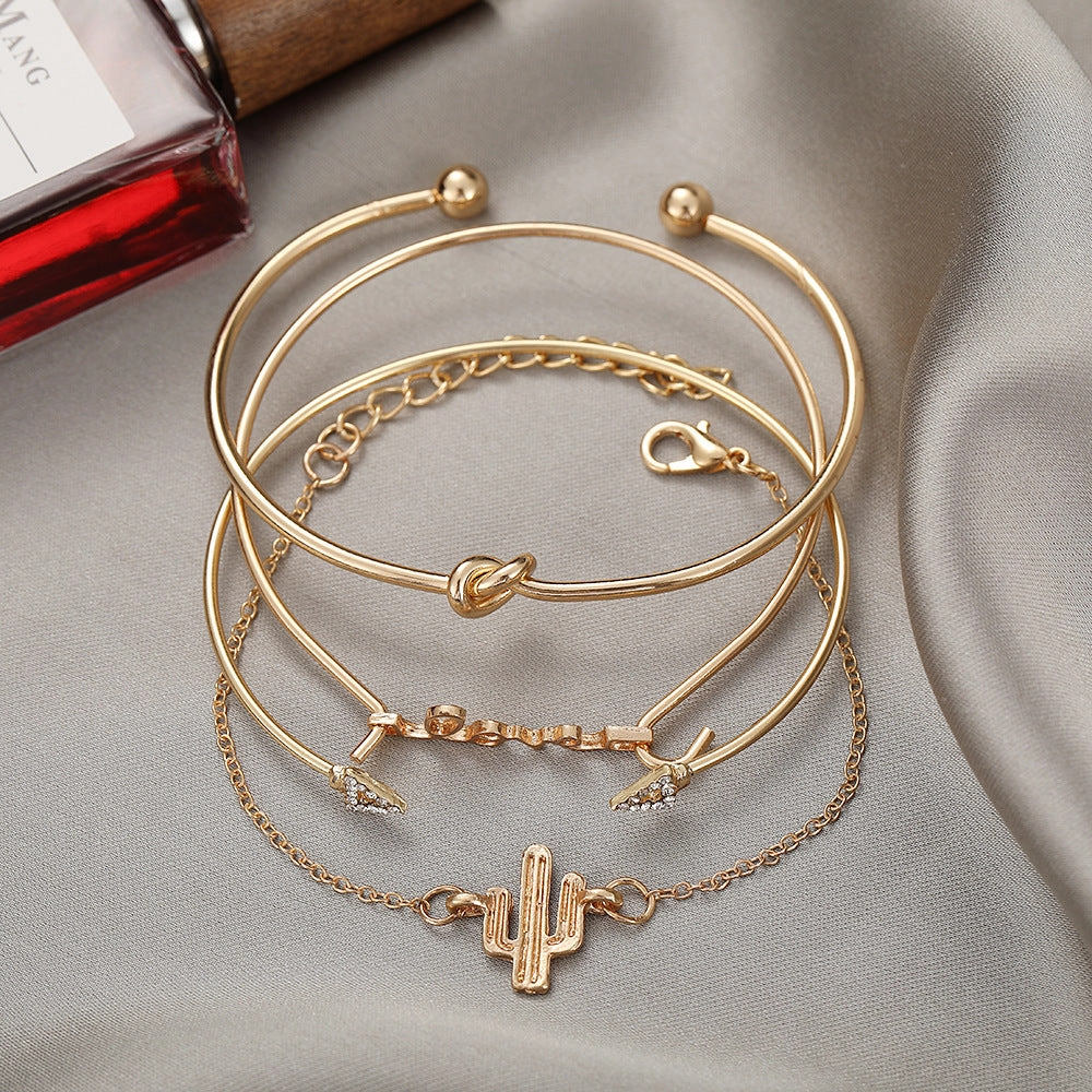 Wholesale Hollow Petals Leaves Alloy Bracelet Set of Four
