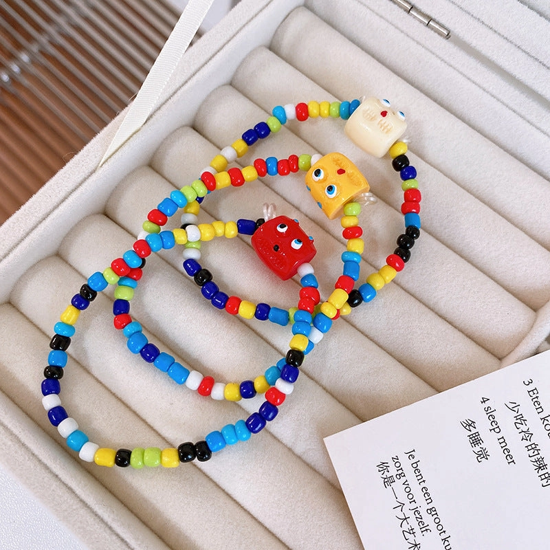Wholesale Imitation Pearl Funny Little Monster Bracelet