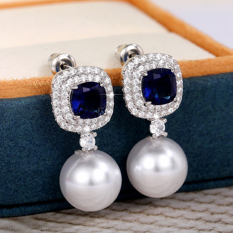 Wholesale Imitation Pearl Inlaid Blue Zircon Earrings